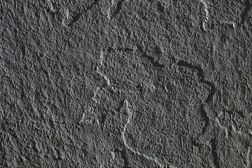 Neutral background with low contrast. Gray abstract stone texture background. Plaster texture for background