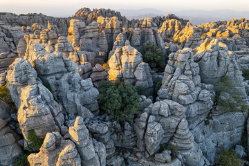 Unreal rock formation and landscape of Torcal de Antequera in Malaga, Andalusia, Spain. Aerial drone View