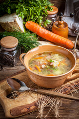 Pea soup with vegetables and bacon.