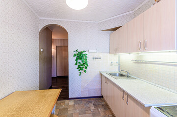 interior apartment kitchen and dining room, refectory area, cooking equipment, table furniture, stove