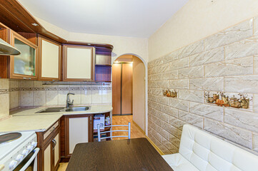 interior apartment kitchen and dining room, refectory area, cooking equipment, table furniture, stove