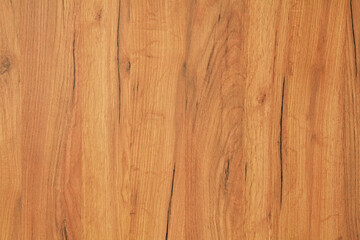 Light-brown or beige textured surface. Brown wooden texture, background. Plank with natural pine wood background. Natural decorative elements in construction and decoration. Finishing material