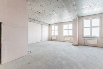 rough repairs for self-finishing. interior decoration, bare walls of the room, stage of construction