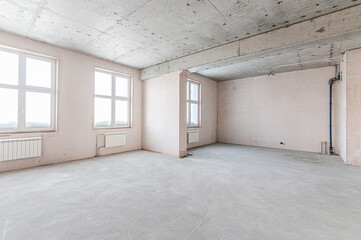 rough repairs for self-finishing. interior decoration, bare walls of the room, stage of construction