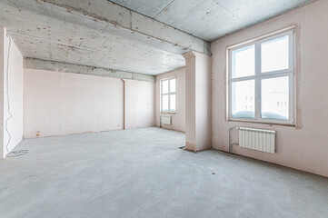 rough repairs for self-finishing. interior decoration, bare walls of the room, stage of construction