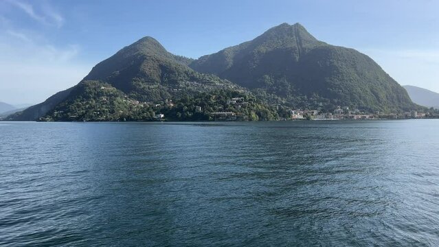 Tranquil Journey on the boat on Lago Maggiore between Verbania to Laveno Mombello at the Switzerland-Italy border. The viewer is treated to breathtaking vistas of  the region of lake Maggiore