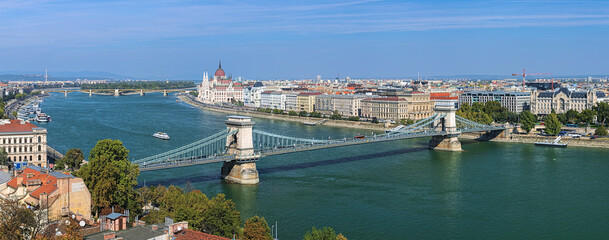 View of the Szechenyi Chain Bridge over Danube and the Hungarian Parliament Building in Budapest, Hungary - 666117039