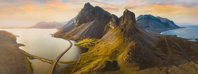 Foto op Plexiglas Noord-Europa beautiful scenic road in Iceland, nature landscape aerial panorama, spectacular mountains and coast with sunset light