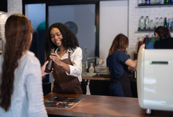 Eco friendly client show responsibility, raising awareness, reducing waste with reusable coffee mug