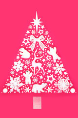 Fototapeta na wymiar Christmas tree abstract North Pole surreal design on pink with snowflakes and white bauble ornaments. Concept symbol for holiday season, greeting card, gift tag, label.