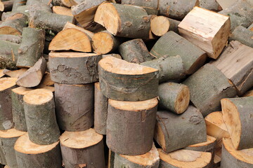 stacked dry firewood as a background