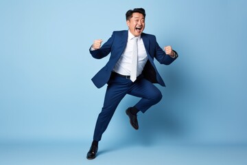 Fototapeta na wymiar Asian businessman dancing excited happy