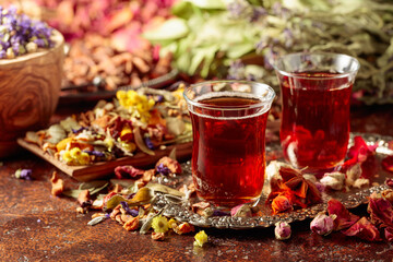 Herbal tea and a mix of various dried medicinal plants and herbs.