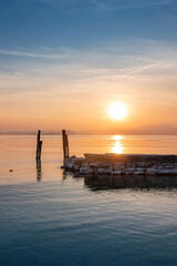 Fototapeta premium Sun setting at Lago di Garda, Veneto, Italy