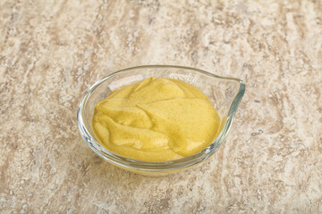 Organic mustard sauce in the bowl