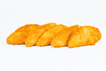 Fast food. Breaded Chicken Inner Fillet on a White Background,Chicken Breaded Raw Meat. Fast cooking. Breaded chicken nuggets. Homemade food at home. Chicken Breaded Fillet.