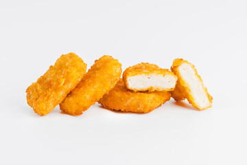 Chicken Breaded Fillet.Fast food. Breaded Chicken Inner Fillet on a White Background,Chicken Breaded Raw Meat. Fast cooking. Breaded chicken nuggets. Homemade food at home.