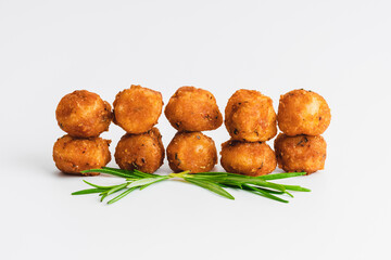 Breaded Chicken Inner Fillet on a White Background,Chicken Breaded Raw Meat.Chicken Breaded Fillet.Fast food. Fast cooking. Breaded chicken nuggets. Homemade food at home.