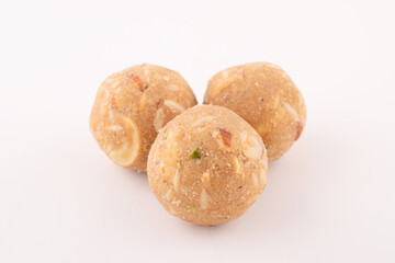 Panjiri ladoo mixed with dry fruits isolated on white background