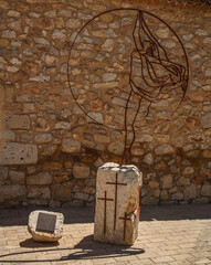 Iron sculpture with a cement base simulating a ballet dancer