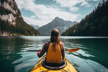 Young woman kayaking on lake in mountains. Adventure and travel concept, Female kayaking on a mountain lake, rear view, no face revealed, natural background, AI Generated