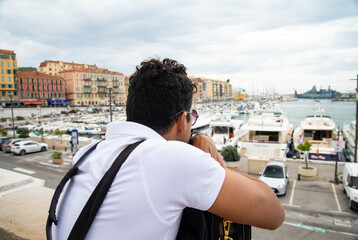 A man stands at a peaceful harbor lost in contemplation, his eyes fixed on the distant horizon. Pensive Moments at the Harbor beautifully captures the essence of deep reflection and soul-searching