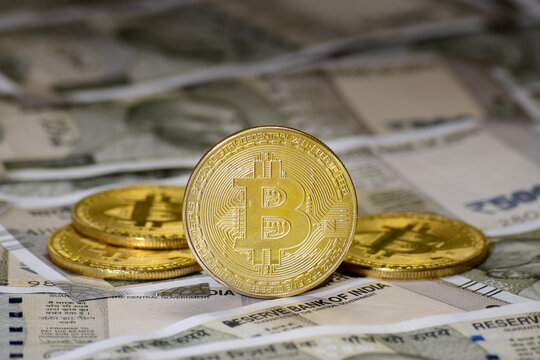 Closeup of bitcoin indian currency note