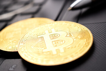 Closeup of crypto bitcoin on latop