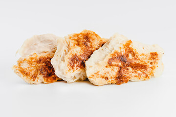 Fast cooking.Chicken fillets fried until half cooked, semi-finished product on a white background. Fast homemade food.Fast food. Quick cooking at home. Copy space.