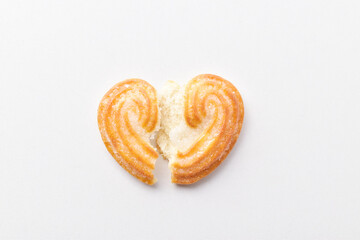 Broken heart biscuit on white background, break up concept