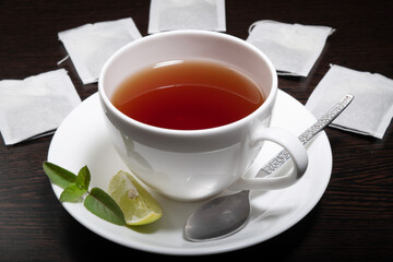 Lemon tea cup with tea bag on the table