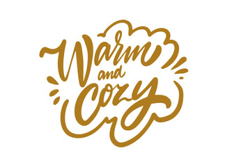 Warm and Cozy handwritten gold color lettering phrase.
