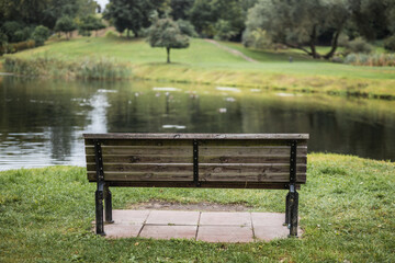 A quiet, secluded place in a green park near a pond - peace and quiet for thoughts and inspiration