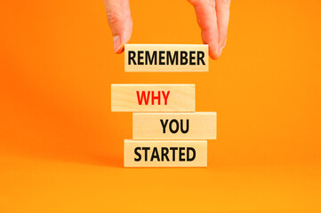Remember why you started symbol. Concept word Remember why you started on wooden block. Beautiful...