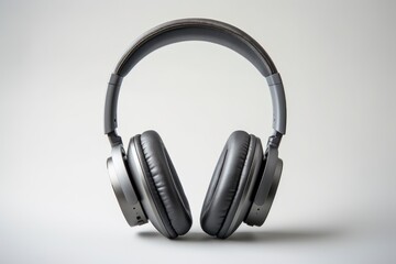 Fototapeta na wymiar A pair of high-quality noise-canceling headphones, elegantly isolated on a pristine white backdrop