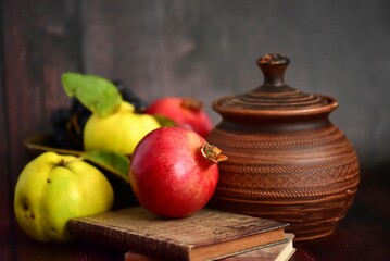 still life with pomegranate and quince