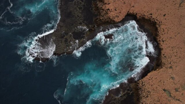 aerial video of waves crashing along the Great Australian Bite in 4k