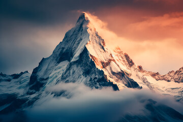 Beautiful and impressive mountain peak among the clouds. Mountain landscape, mountain top.