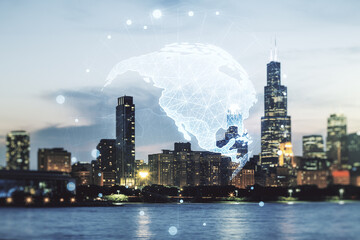 Digital map of North America hologram on Chicago cityscape background, global technology concept. Multiexposure