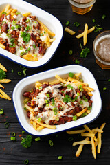 Chili Cheese Potato Fries topped with hot minced beef and cheese sauce