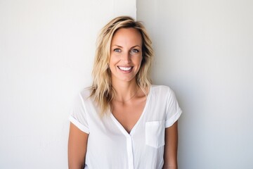 Blond woman smile face portrait at home living room