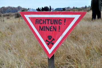 mines sign in german