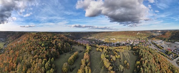 360 degrees panoramic aerial view of the jura nature mountains near the Blaubeuren on sunny day. Autumn. Swabian Alb Landscape. South Germany. - obrazy, fototapety, plakaty