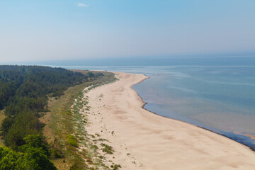Aerial view of the Baltic Sea shore line, Lithuania. Beautiful sea coast on sunny summer day.
