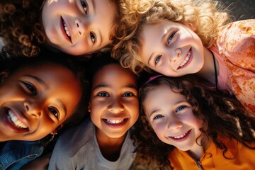Obraz premium A joyful and diverse group of children from various backgrounds smiling and embracing each other