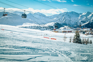 Ski tracks in the fresh snow on the slope, France