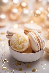 White and gold colored luxury elegantly macarons for Christmas and cozy blur background
