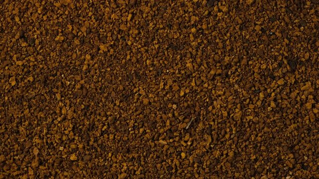 Texture of Chaga tea powder, close-up. Video 4K, Rotating. Chaga tea is a strong antioxidant, boosts immune system, has detox quality, improves digestive.