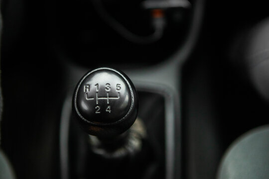 Five-speed manual transmission. Gear shift lever. Car. Car salon