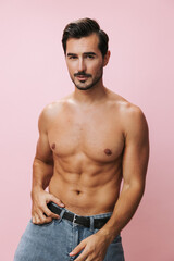 Man muscle background sport sexy muscular torso belt pink lifestyle body naked fitness jeans